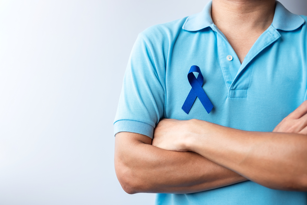 Manwearingcolorectalcancerblueribbon