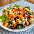 RoastedVegetableSaladwithChipotleDressinginawhitebowl